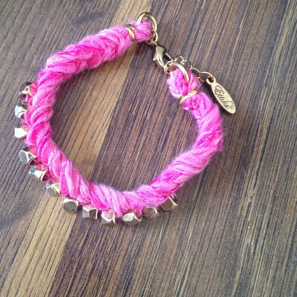 Ettika bracelet. Hot pink with gold studs.