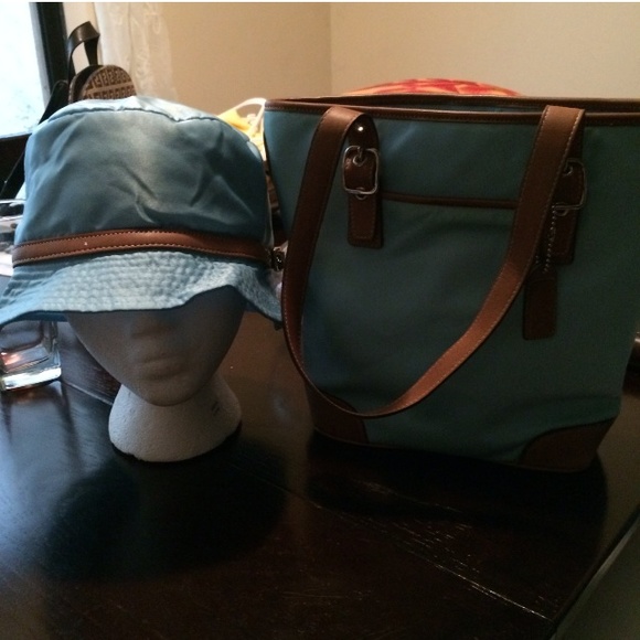 Blue and tan Coach bag and hat