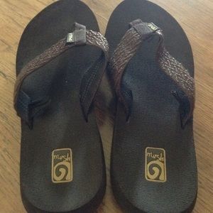 Brown Teva flip flops