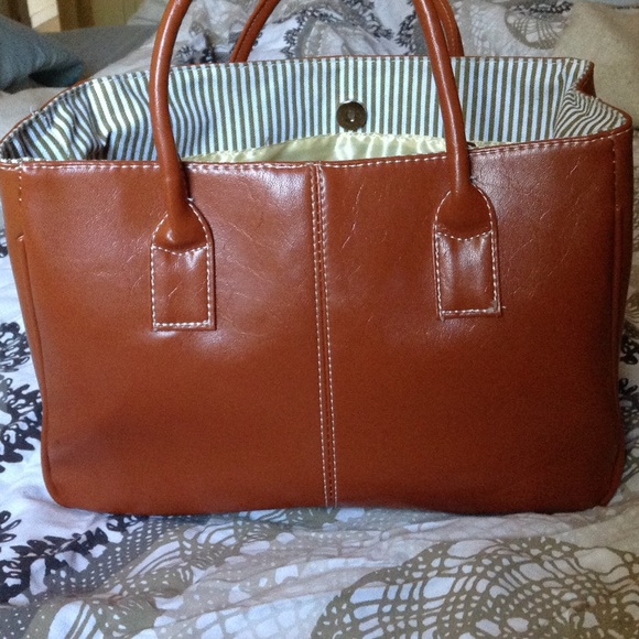 Tan purse. Used only one time