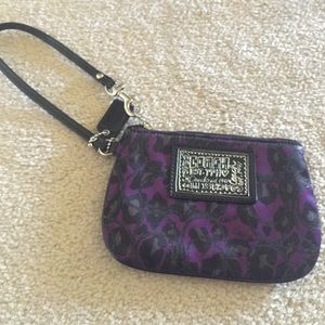 Purple and black mini Coach wristlet