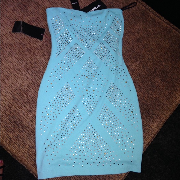Light blue Bebe dress size SMALL. New with tags :)