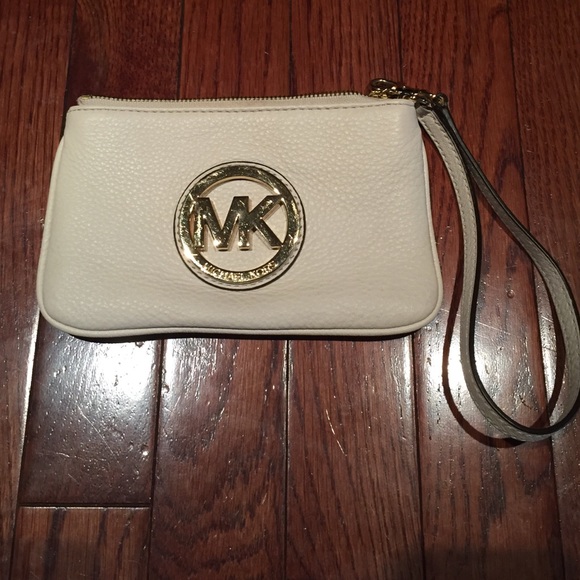 Authentic Micheal Kors Clutch. White and Gold.