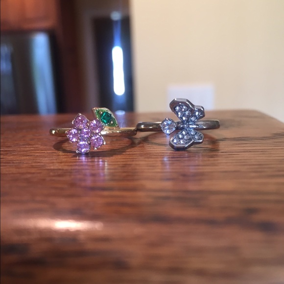 Juice Couture butterfly and pink flower rings