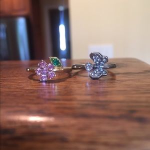 Juice Couture butterfly and pink flower rings