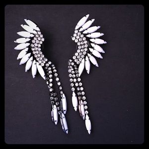 Elizabeth Cole white Mohawk earrings
