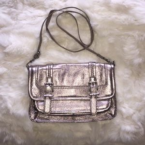 Cute metallic cross body by The Sak