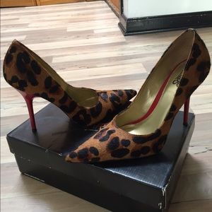 Leopard with red bottom heels