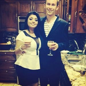 White and black peplum top