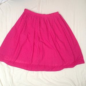 Bright pink knee length skirt