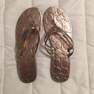 Coach silver flip flops, size 7.5