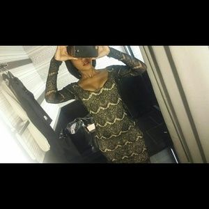 Black and nude luxe lace bebe dress