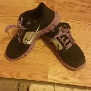 Black and purple Nike sneakers