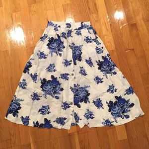 Midlength floral skirt.