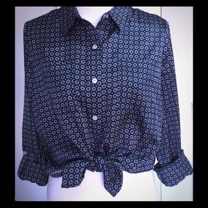Navy blue top with white/ silver print detail.