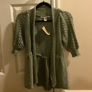 I am selling an American rag cardigan sweater.