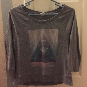 Grey shirt with triangle/word design