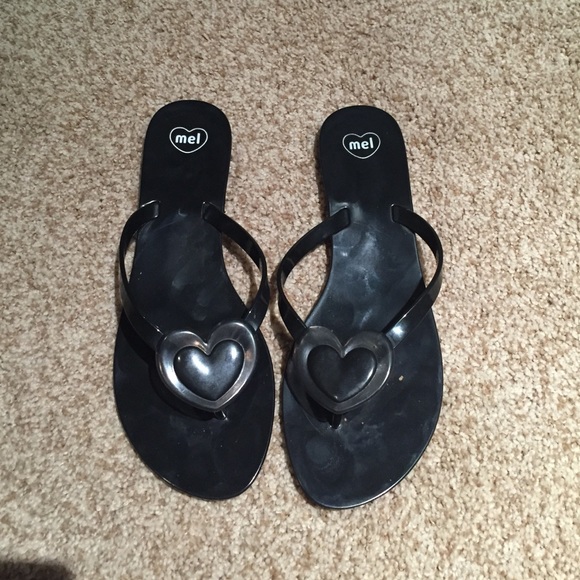 Black jelly flip flops