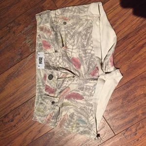 denim shorts with feather pattern