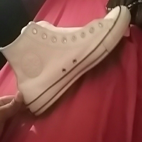 All white leather Chuck taylors