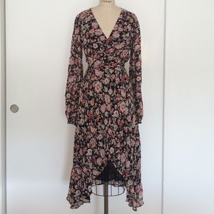 NWOT Reformation floral wrap dress size small.