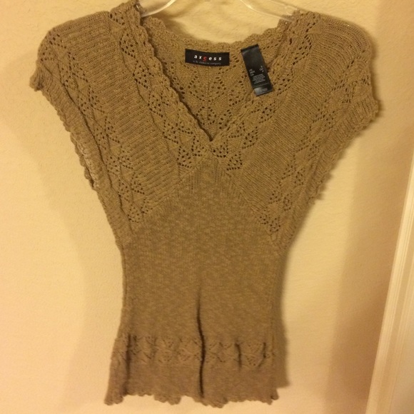 Light brown light sweater.