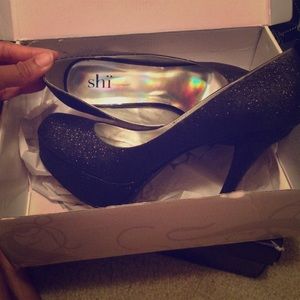 Black shi heels. Sparkly. In good condition
