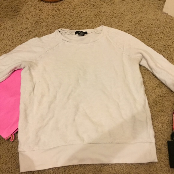 White sweater with ribbed texture