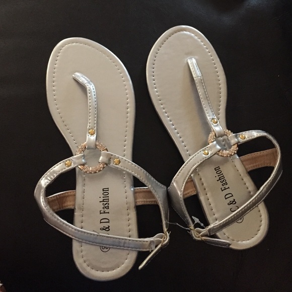 Brand new silver sandles with gold detailing