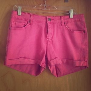 pink shorts.