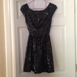 Black sequins cap sleeve dress