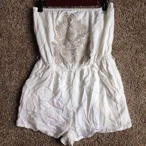 Charlotte Russe medium cream romper