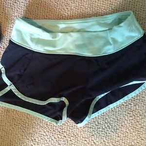 black and green Lulullemon running shorts