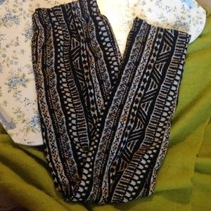 Tribal/animal print patterned jogger pants