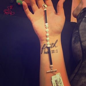 Light blue bracelet with black leather