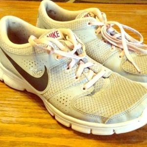 Nike flex experience running shoes.