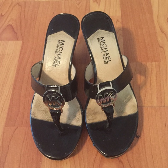 Michael Kors Shoes - Michael kors black and silver wedges