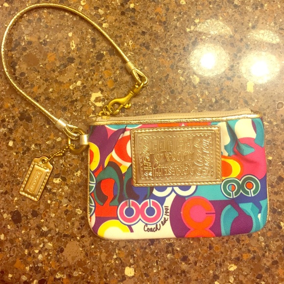 Adorable coach wristlet from the Poppy Collection
