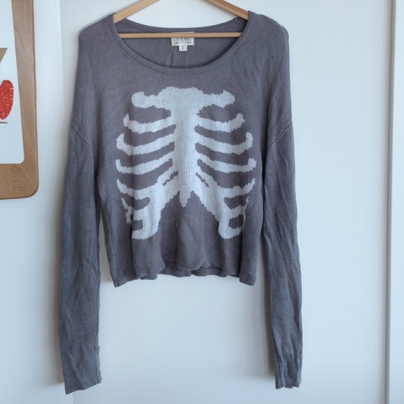 Gray knit sweater with white ribcage design