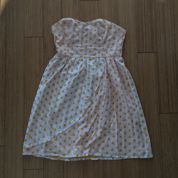 White and orange fruit patterned dress