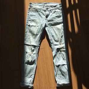 Blue and white pinstriped distressed jeans