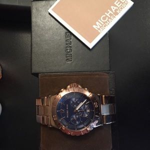 Michael kors watch big face watch.