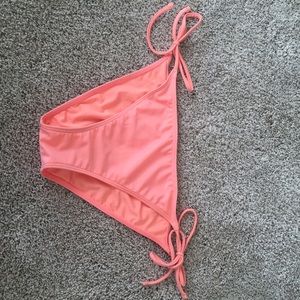 Super cute bikini bottoms in beautiful coral color