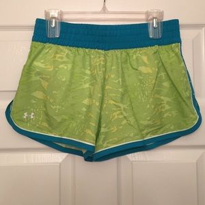 Under Armour athletic shorts with lining, size M