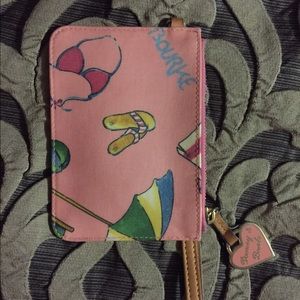 Dooney and Bourke pink Miami wristlet gently used