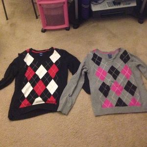 Two Argyle type sweaters