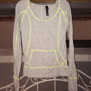gray hooded sweatshirt with thumb openings