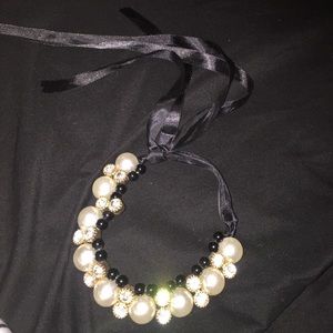 Necklace with ties ribbon