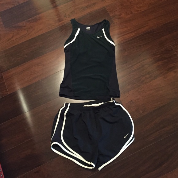 Navy blue Nike tennis top and shorts
