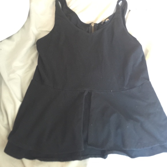 Black sleeveless peplum top